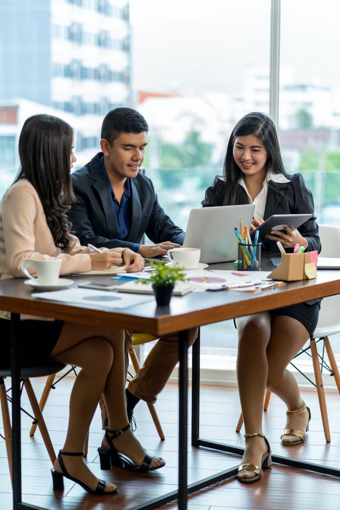 Group Of Asian and Multiethnic Business people with formal suit working and brainstorming